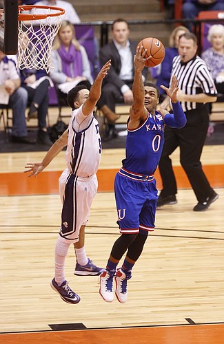 Kansas guard Frank Mason III (0) heads up to the bucket against TCU Horned Frogs guard Kyan Anderson (5) during the first half at Wilkerson-Greines Activity Center on Wednesday, Jan. 28, 2015 in Fort Worth, Texas.