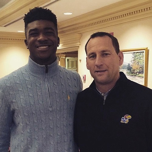 New KU safety Denzel Feaster with head coach David Beaty during a recent visit. 