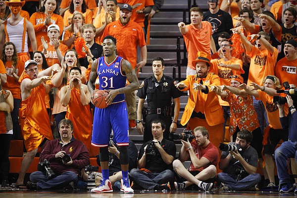 Kansas forward Jamari Traylor (31) takes some ribbing from the Oklahoma State student section before inbounding the ball during the second half on Saturday, Feb. 7, 2015 at Gallagher-Iba Arena.