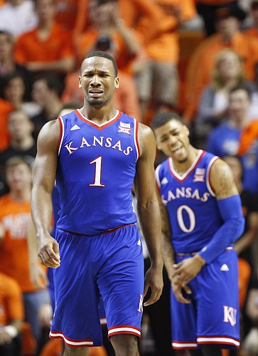 Kansas guard Wayne Selden Jr. (1) and Kansas guard Frank Mason III (0) vent after a foul was called against the Jayhawks during the second half on Saturday, Feb. 7, 2015 at Gallagher-Iba Arena.