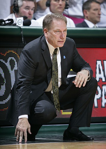 Michigan State coach Tom Izzo watches the action during the second half of an NCAA college basketball game against Illinois, Saturday, Feb. 7, 2015, in East Lansing, Mich. Illinois won 59-54. (AP Photo/Al Goldis)
