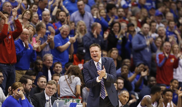 Kansas head coach Bill Self claps for his players after a stretch of good play during the second half, Saturday, Feb. 14, 2015 at Allen Fieldhouse.