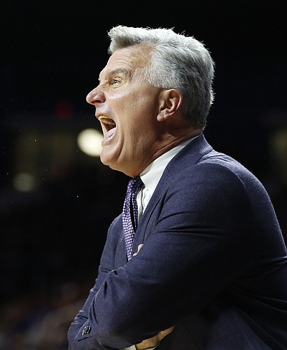 Kansas State head coach Bruce Weber gets heated during the first half, Monday, Feb. 23, 2015 at Bramlage Coliseum.