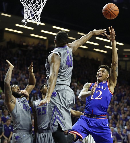 Kansas guard Kelly Oubre Jr. (12) pulls up for a shot against Kansas State forward Stephen Hurt (41) during the first half, Monday, Feb. 23, 2015 at Bramlage Coliseum.