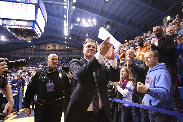 Kansas head coach Bill Self applauds the crowd as he leaves the floor following the Jayhawks' 69-64 win over Texas on Saturday, Feb. 28, 2015 at Allen Fieldhouse.