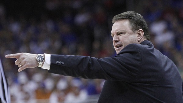 Kansas coach Bill Self responds to a referees call in the second half of the Jayhawk’s 64-59 win over TCU Thursday at the Sprint Center in Kansas City, MO.