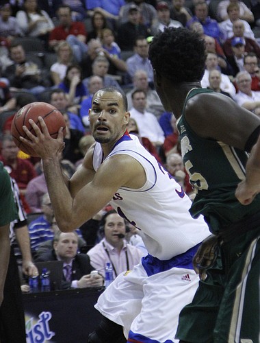 Perry Ellis (34) positions himself for a shot against Baylor's defense in the Jayhawk’s 62-52 win over Baylor in the semi-final of the Big 12 Tournament Friday. 