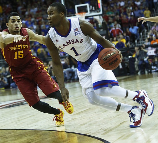 Kansas guard Wayne Selden Jr. (1) tries to drive on Iowa State's Naz Long (33) in the Jayhawk’s 70-66 loss to Iowa State in the championship game of the Big 12 Tournament Saturday in Kansas City, MO.