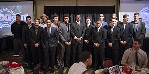 The 2014-15 Kansas men's basketball team assemble for a team photograph at the conclusion of the annual postseason awards banquet Monday April 13, 2015. 