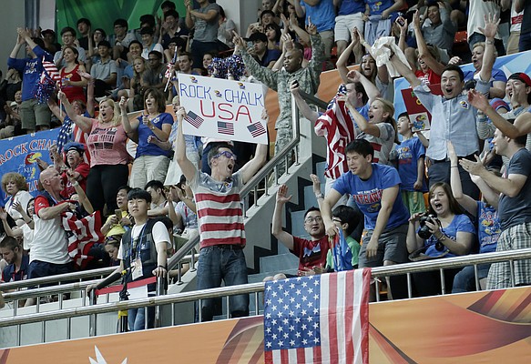 Kansas Jayhawk fans celebrate Team USA's 66-57 win against Turkey Saturday, July 4, in Gwangju, South Korea.
