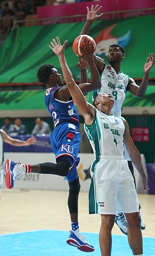 Kansas guard Lagerald Vick (2) drives in the lane in a Team USA 81-72 win over against Brazil Sunday, July 5, in Gwangju, South Korea..