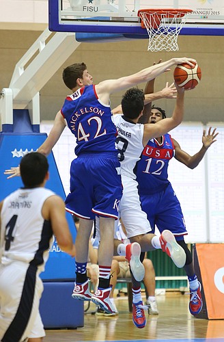 Kansas center Hunter Mickelson (42) blocks a shot by Chilean guard Fernando Schuler (13) with Team USA guard Julian DeBose (12) also defending in a Team USA game against Chile Tuesday, July 7, at the World University Games in South Korea.