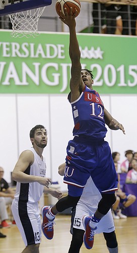 Team USA guard Julian DeBose (12) drives for a score in a 106-41 Team USA win against Chile Tuesday, July 7, at the World University Games in South Korea.