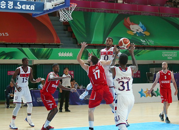 Kansas guard Frank Mason III (0) passes to Jamari Traylor who scored on the play during a Team USA 96-57 win over Switzerland Thursday, July 9, at the World University Games in South Korea..