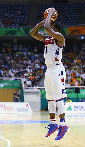 Kansas guard Wayne Selden Jr. (1) hits a three-point basket that put Team USA ahead 80-77 in a second overtime, and was the deciding basket in a double-overtime 84-77 win against Germany Monday, July 13, at the World University Games in South Korea.