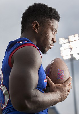 Kansas junior defensive end Damani Mosby (#13), photographed at a KU football media day event Saturday August 8, 2015. 