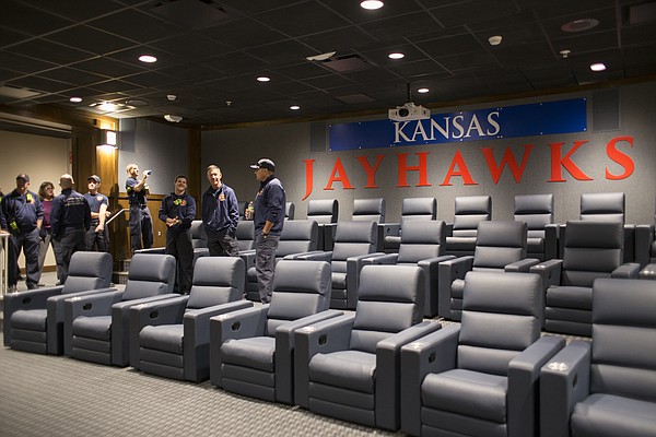 Lawrence-Douglas County Fire and Medical personnel tour the media room inside the new $11.2 million McCarthy Hall, which houses the Kansas men's basketball team.