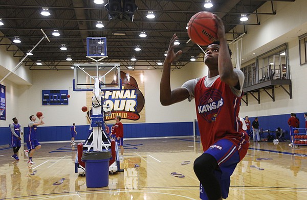 KU freshman Lagerald Vick works on layups early during practice on Thursday, Oct. 15, 2015.
