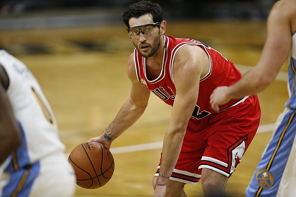 Chicago Bulls guard Kirk Hinrich (12) looks to pass the ball against the Denver Nuggets in the first half of an NBA preseason basketball game Thursday, Oct. 8, 2015, in Boulder, Colo. (AP Photo/David Zalubowski)