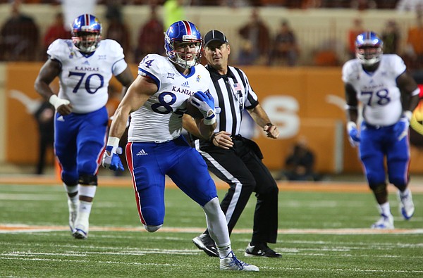 Kansas tight end Ben Johnson (84) breaks up the field after a catch during the first quarter on Saturday, Nov. 7, 2015 at Darrell K. Royal Stadium in Austin, Texas.