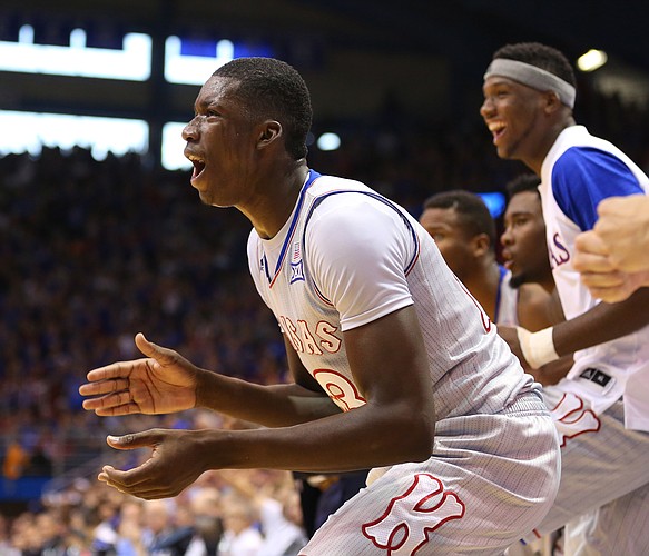 Kansas forward Cheick Diallo (13) and the Jayhawk bench celebrate a bucket and a foul by Kansas forward Landen Lucas (33) during the second half, Saturday, Dec. 5, 2015 at Allen Fieldhouse.