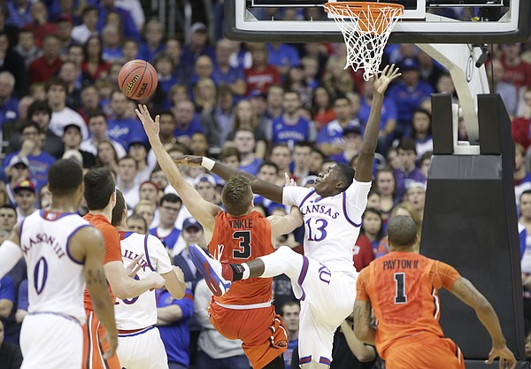 Kansas forward Cheick Diallo (13) fouls Oregon State forward Tres Tinkle (3) on a shot during the first half, Saturday, Dec. 12, 2015 at Sprint Center.