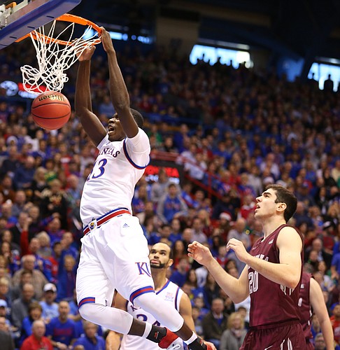 Kansas forward Cheick Diallo (13) delivers a dunk during the first half, Saturday, Dec. 19, 2015 at Allen Fieldhouse.
