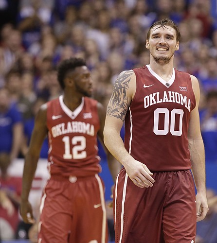 Oklahoma forward Ryan Spangler (00) grimaces after picking up a foul during the second half, Monday, Jan. 4, 2016 at Allen Fieldhouse.