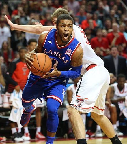 Kansas guard Frank Mason III (0) moves past Texas Tech forward Matthew Temple (34) as he looks for an outlet during the first half, Saturday, Jan. 9, 2016 at United Spirit Arena in Lubbock, Texas.