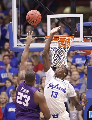 Kansas forward Cheick Diallo (13) gets up to reject a shot from TCU forward Devonta Abron (23) during the first half, Saturday, Jan. 16, 2016 at Allen Fieldhouse
