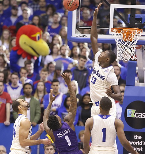 Kansas forward Cheick Diallo (13) gets up to reject a shot from TCU guard Chauncey Collins (1) during the second half, Saturday, Jan. 16, 2016 at Allen Fieldhouse. Also pictured are Kansas forward Perry Ellis (34) and guard Wayne Selden Jr. (1).