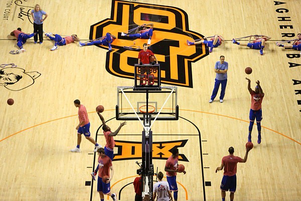 Members of the Kansas basketball team warm up Jan. 19, 2016, at Gallagher-Iba Arena, in Stillwater, Okla., prior to the Jayhawks' game at Oklahoma State.