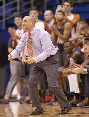 Texas head coach Shaka Smart directs his defense during the second half, Saturday, Jan. 23, 2016 at Allen Fieldhouse.