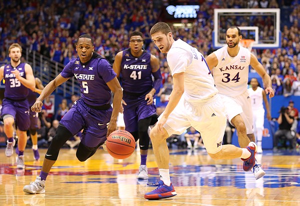 Kansas guard Sviatoslav Mykhailiuk comes away with a steal from Kansas State guard Barry Brown (5) during the second half on Wednesday, Feb. 3, 2016 at Allen Fieldhouse.