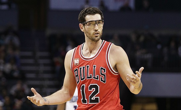 Chicago Bulls' Kirk Hinrich (12) reacts to being called for a foul against the Charlotte Hornets in the second half of an NBA basketball game in Charlotte, N.C., Monday, Feb. 8, 2016. The Hornets won 108-91. (AP Photo/Chuck Burton)
