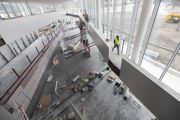Construction continues within the DeBruce Center and around the "Rules Concourse," which will tell the story of basketball and lead to the "Rules Gallery," where the James Naismith's original rules of "Basket Ball" will be displayed. The building's interior is pictured Thursday, Feb. 25, 2016.
