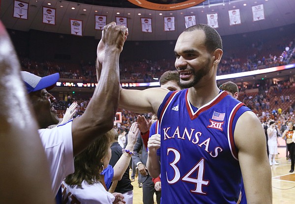 Kansas forward Perry Ellis greets fans as he exits the court after an 86-56 win over the Longhorns Monday, Feb. 29, 2016 at the Frank Erwin Center in Austin, Texas. 
