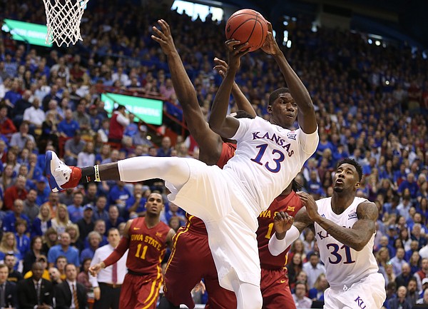 Kansas forward Cheick Diallo (13) pulls down an offensive rebound during the first half on Saturday, March 5, 2016 at Allen Fieldhouse.