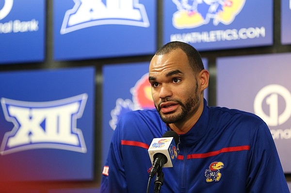 Kansas forward Perry Ellis talks with media members during a news conference following the NCAA Tournament selection show on CBS, Sunday, March 13, 2016 at Allen Fieldhouse on the campus of the University of Kansas in Lawrence, Kan. The Jayhawks were given the No. 1 seed in the South Regional and will play Austin Peay on Thursday in Des Moines.