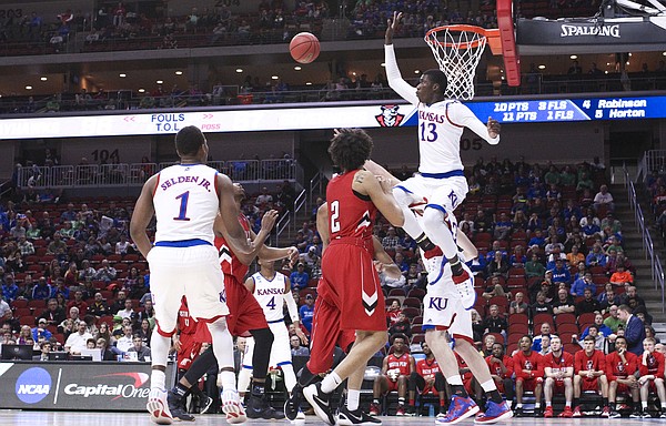 Kansas forward Cheick Diallo (13) gets up to reject a shot during the second half, Thursday, March 17, 2016 at Wells Fargo Arena in Des Moines, Iowa.