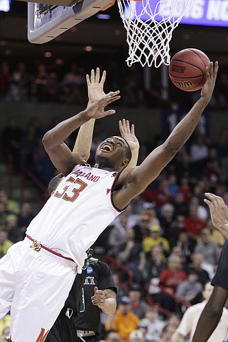 Maryland center Diamond Stone (33) shoots against Hawaii forward Stefan Jankovic during the first half of a second-round men's college basketball game in the NCAA Tournament in Spokane, Wash., Sunday, March 20, 2016. (AP Photo/Young Kwak)