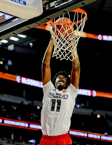 West forward Josh Jackson, from Justin-Siena/Prolific Prep Academy in Napa, Calif., dunks against the East team during the McDonald's All-American boys basketball game, Wednesday, March 30, 2016, in Chicago. The West beat the East 114-107. (AP Photo/Matt Marton)
