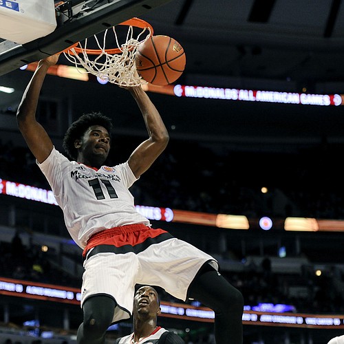 West forward Josh Jackson, from Justin-Siena in Napa, Calif., dunks against the East team during the McDonald's All-American boys basketball game, Wednesday, March 30, 2016, in Chicago. The West beat the East 114-107.