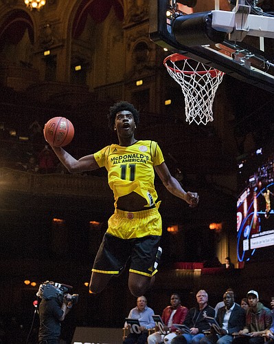 Josh Jackson, from Napa, California, competes in the slam dunk contest during the McDonald's All-American Jam Fest, Monday, March 28, 2016, in Chicago. (AP Photo/Matt Marton)