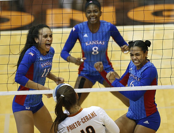 Kansas' Zoe Hill (6) celebrates scoring over Texas' Paulina Prieto Cerame (19) with Kelsie Payne (8) and Ainise Havili (11) during a match at Gregory Gym in Austin, Saturday, Sept. 24, 2016. 