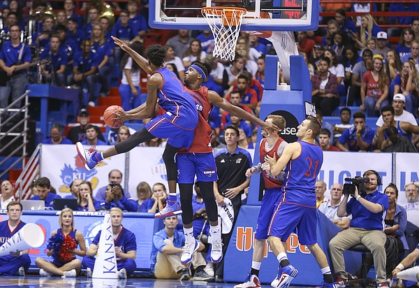 Kansas forward Carlton Bragg Jr. looks to defend against a shot from LaGerald Vick during Late Night in the Phog on Saturday, Oct. 1, 2016 at Allen Fieldhouse.