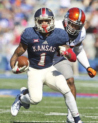 Kansas wide receiver LaQuvionte Gonzalez (1) takes off up the field past Oklahoma State linebacker Chad Whitener (45) during the third quarter on Saturday, Oct. 22, 2016 at Memorial Stadium.