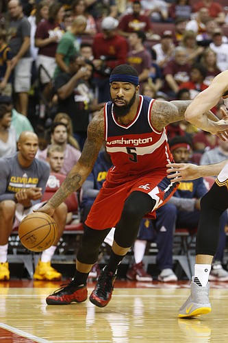 Washington Wizards' Markieff Morris plays against the Cleveland Cavaliers during an NBA preseason basketball game Tuesday, Oct. 18, 2016, in Columbus, Ohio. (AP Photo/Jay LaPrete)