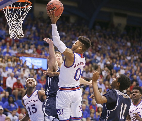Kansas guard Frank Mason III (0) gets to the bucket against Washburn during the first half, Tuesday, Nov. 1, 2016 at Allen Fieldhouse.