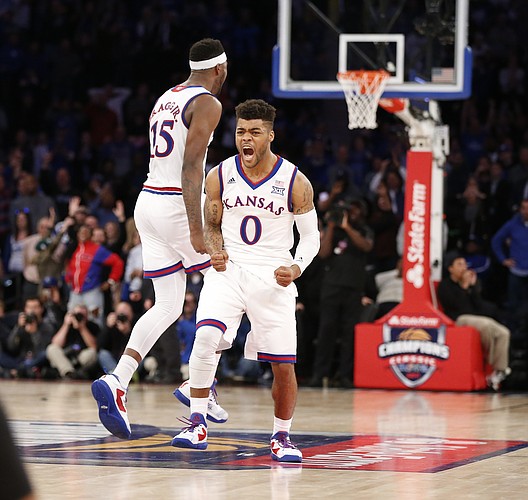 Kansas guard Frank Mason III (0) roars after hitting the final shot for a 77-75 win over Duke during the Champions Classic on Tuesday, Nov. 15, 2016 at Madison Square Garden in New York.